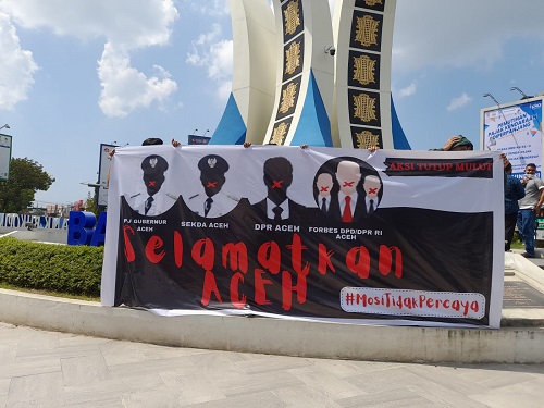 Mosi Tak Percaya Pada Pj Gubernur Aceh, IMPAS Gelar Aksi Tutup Mulut