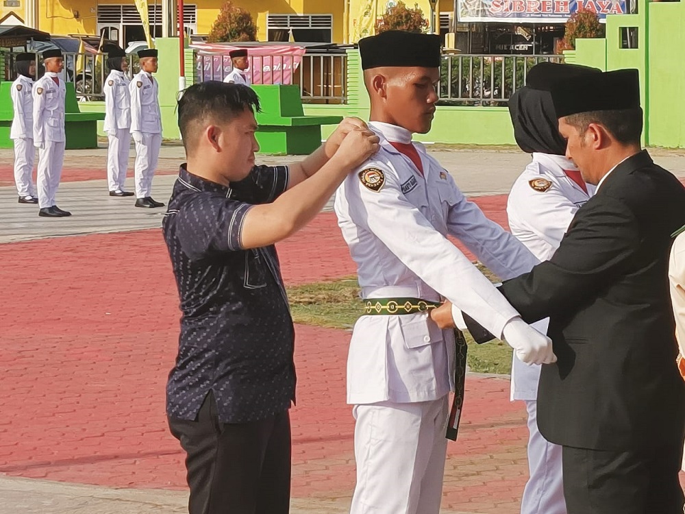 Pj Bupati Agara Kukuhkan Paskibraka 2024