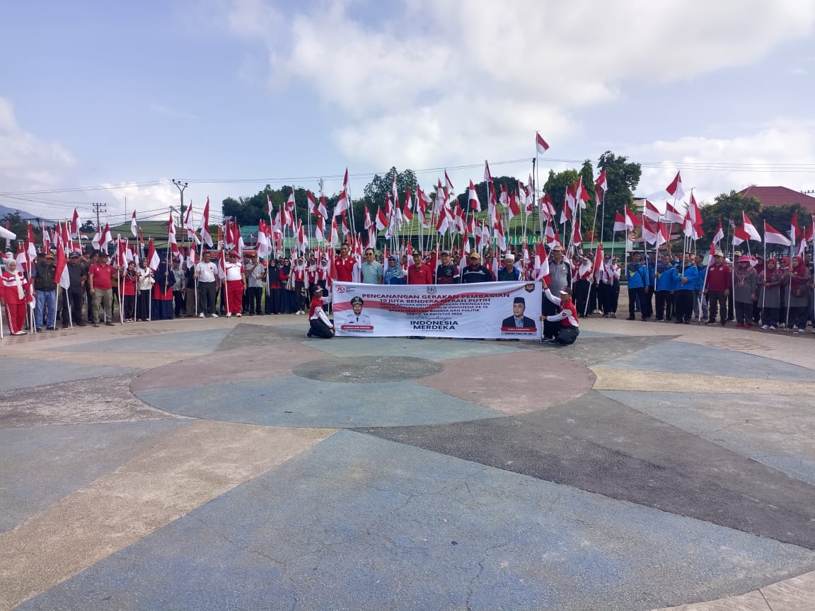 Pj Bupati Agara Pimpin Apel Gerakan Pembagian 10 Juta Bendera Merah Putih