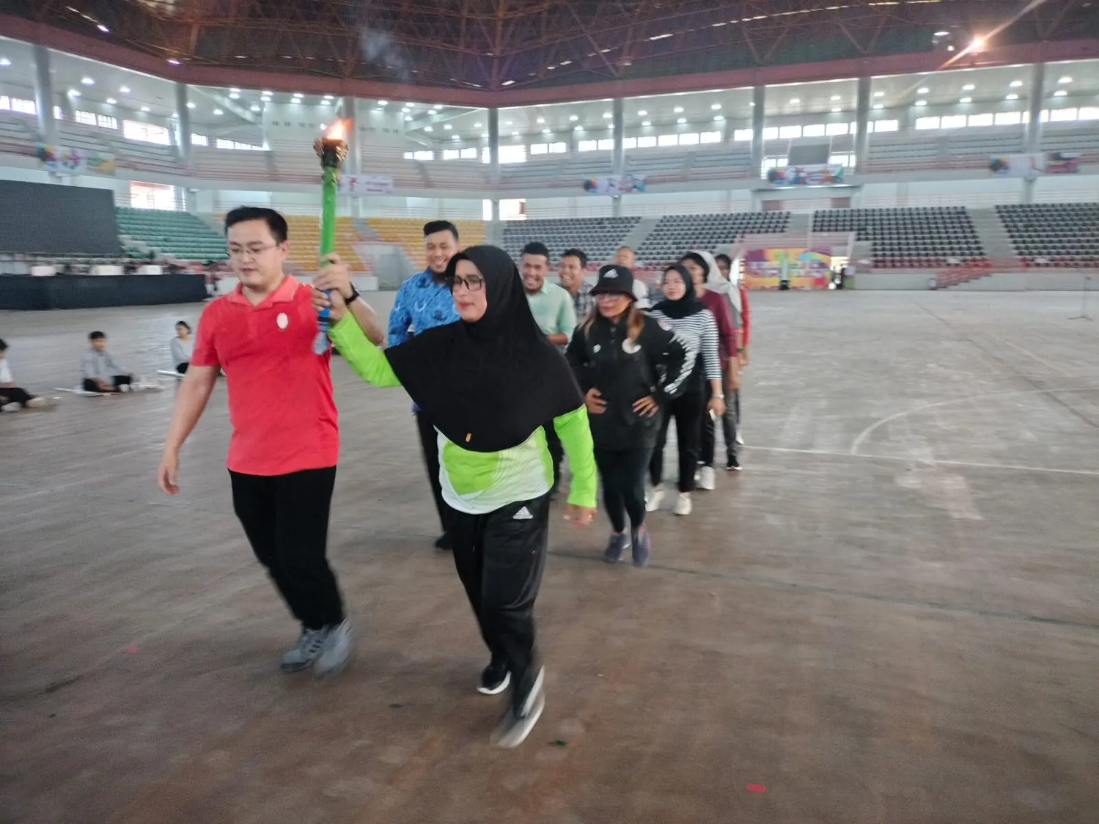Dahliana - Heriyanto Pembawa Obor Porprovsu