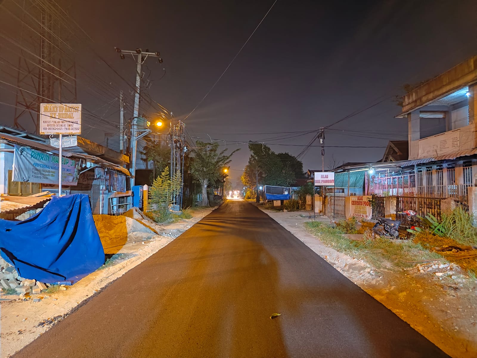 <em>Jalan Pelita IV Selesai Diaspal, Masyarakat Semakin Nyaman Berkendara</em>