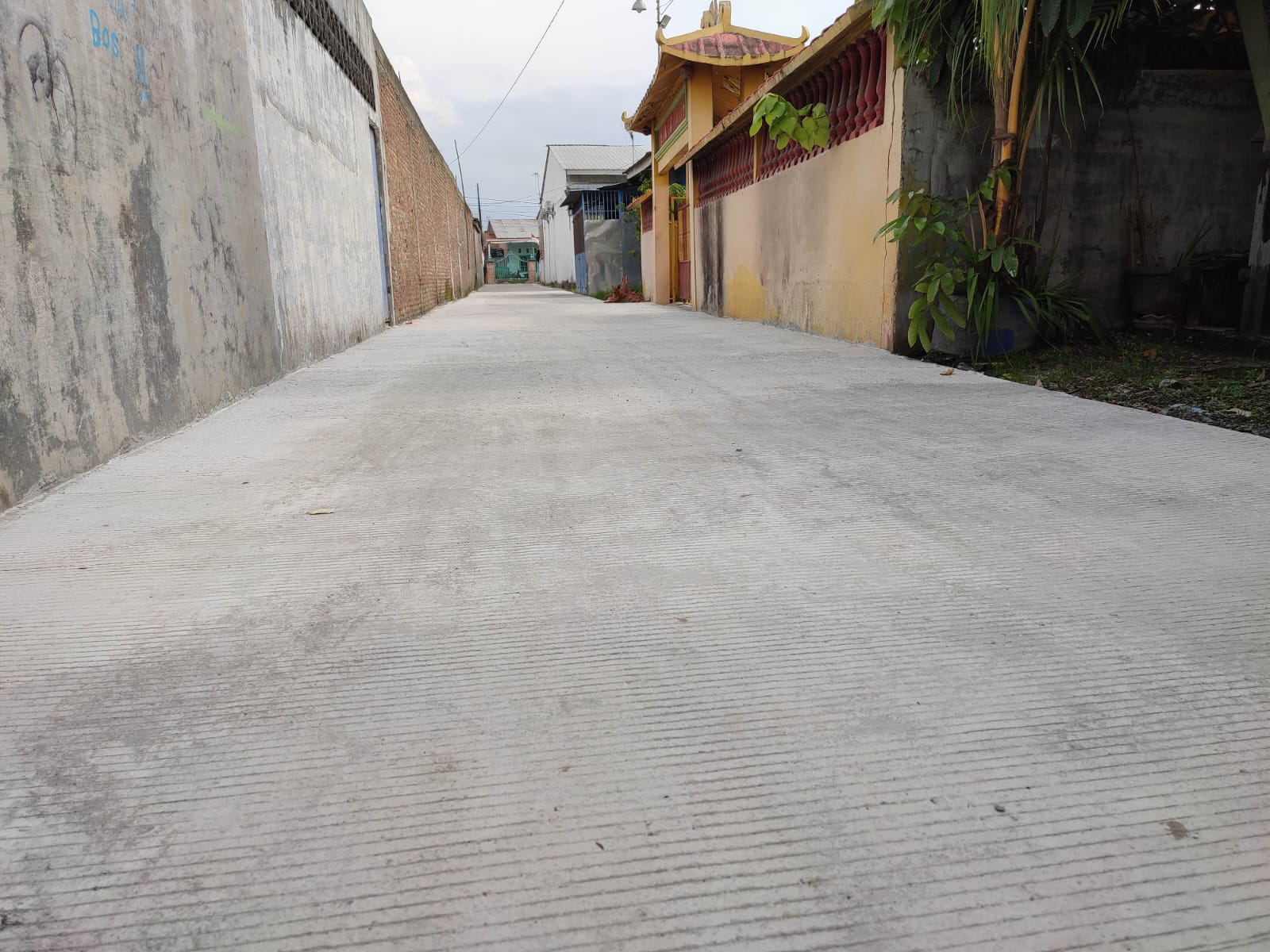Dinas SDABMBK Kota Medan Tuntaskan Pembetonan Jalan Swadaya Gg. Chi Kung