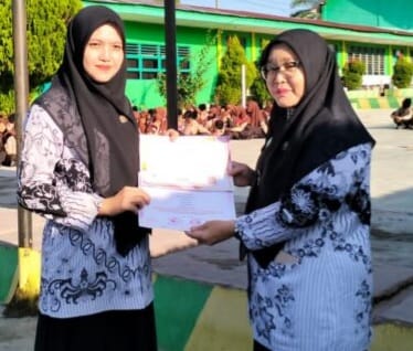 Guru MTsN 1 Padangsidimpuan Raih Medali FUSO 2024