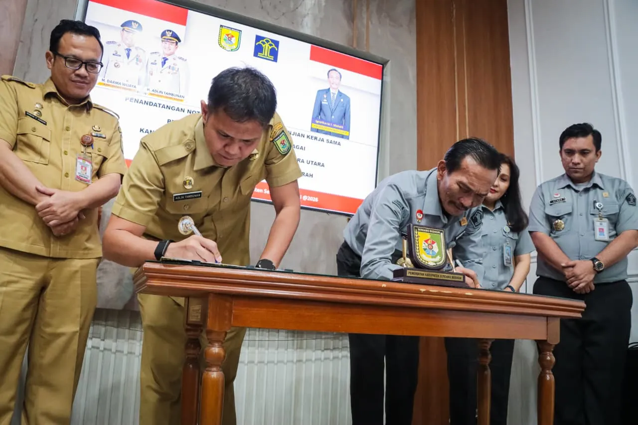 Wabup Adlin Teken Kerja Sama Hukum Dengan Kemenkum Sumut