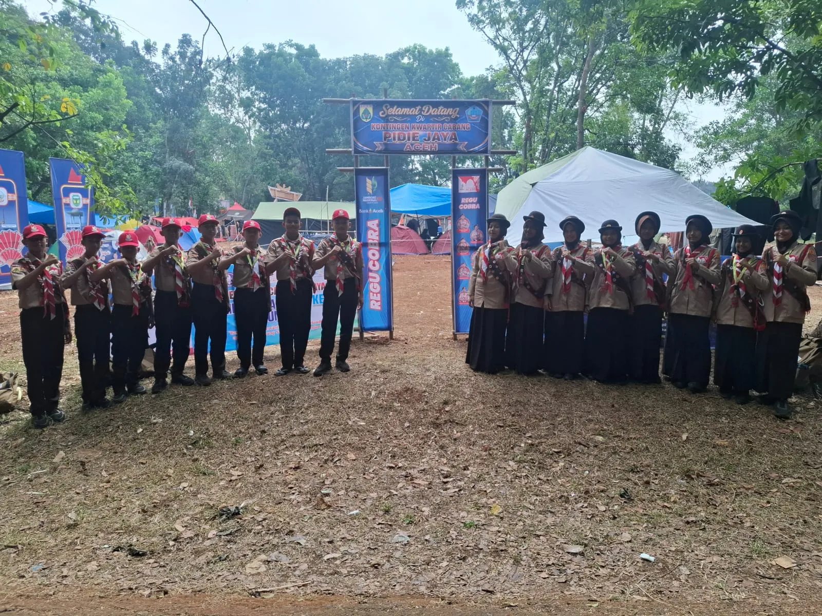 Peserta Jamnas XII Perwakilan Pidie Jaya Tetap Semangat Meski Harus Berjalan 5–7 Kilometer Setiap Hari