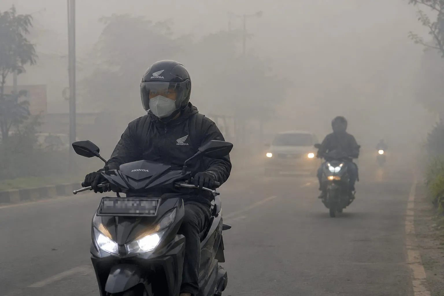 Honda Bagikan Tips #cari_aman Berkendara Diselimuti Kabut Asap