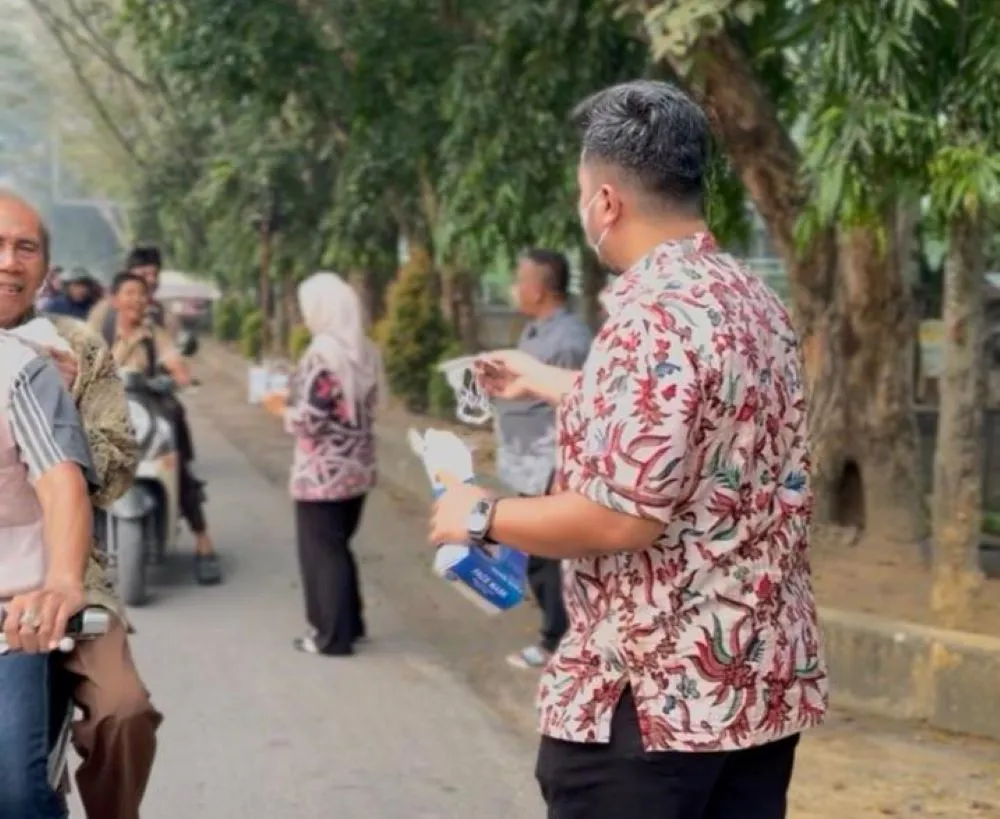 PTPN IV Regional VI Bagikan 5.000 Masker untuk Warga