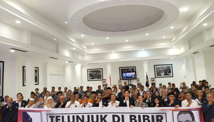 Hadapi Buzzer, Relawan Anies Melawan Dengan Simbol Telunjuk Di Bibir