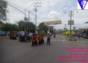 Satlantas Polres Agara Bantu Seberangkan Anak Sekolah