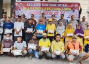 Kapolres Agara, AKBP Bramanti Agus Suyono SH foto bersama seusai bagikan bansos. Waspada,id/Seh Muhammad Amin