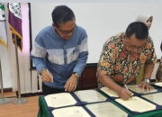 Kepala SMAN 2 Medan Ikuti Rakor Dan Penandatanganan SPK Di Unimed