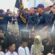 KETUA Harian DPD Angkatan Muda Sisingamangaraja XII (AMS XII) Sumatera Utara (Sumut), Simson Sinambela menyerahkan pataka kepada Marken Situmeang setelah terpilih sebagai Ketua PAC AMS XII Medan Polonia periode 2022-2027, foto bawah acara penyerahan santunan kepada anak yatim-piatu. Waspada/ist