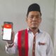 Kepala Dinas Perpustakaan Kabupaten Aceh Tenggara M. Rasadi S.Pd saat menunjukan buku digital/perpustakaan "Perpus Agara" yang berbasis android sudah tersedia di Playstore. Waspada/Ist