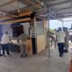Satpol PP bersama WH membongkar warung di pinggir lokasi wisata Waduk Pusong, Lhokseumawe, Kamis (1/12). Waspada/Zainal Abidin