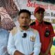KORDINATOR Kadin Batubara Berbagi Burhan dan Loly Sastra didampingi tim relawan di sela-sela menyalurkan bantuan Ketua Kadin H. OK Faizal dan Bupati H. Zahir berupa bahan pangan beras kepada warga.Waspada/Iwan Has
