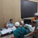 Warga Palas serta calon jamaah umroh dari travel umroh Cahaya Palas sambut baik pelayanan eazy paspor yang difasilitasi DPMP2TSP Kabupaten Padanglawas. (Waspada/Ist)