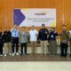 RCEO I/Sumatera 1 Bank Mandiri, Lourentius Aris Budiyanto foto bersama Anggota DPR RI Komisi VI Rudi Hartono Bangun dalam edukasi layanan perbankan kepada masyarakat dan para pelaku UMKM di Binjai.