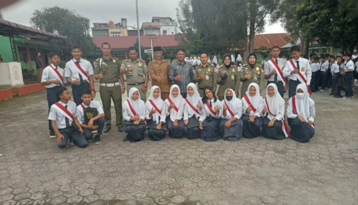 Kasatpol PP Dan WH Sosialisasikan Qanun Jinayat Kepada Pelajar SMPN 1 Bandar