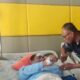 DIRAWAT: Camat Idi Rayeuk, Hasbi, menjenguk Pj Bupati Aceh Timur, Ir Mahyuddin, M.Si, di RSUZA Bandaaceh, Kamis (9/3). Waspada/Ist.