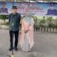 Kapolsek Batangkuis AKP Syahrizal bersama istri saat memberikan sambutannya. (Waspada/ist).