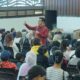 Bane Raja Manalu saat sosialisasi Pengutan Merek kepada 1000 pelaku UMKM di Aula Kampus Nommensen Jalan Sangnaualuh, Kec. Siantar Timur, Kota Pematang Siantar, Rabu (29/3/2023). Waspada/Ist