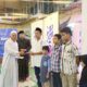 KETUA Yayasan Drs. H. Sotar Muda Nasution MHB memberi santunan untuk anak yatim. Waspada/ist