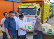 Pj Wali Kota Langsa Serahkan Beras Cadangan Bantuan Pangan