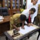 Wali kota dan Kajari Binjai terlihat sedang menandatangani MoU Pemerintah Kota Binjai dan Kejaksaan Negeri. Waspada/Ist