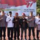 Asisten Administrasi Umum Sekda Aceh, Iskandar AP, foto bersama usai menghadiri Apel Ketua Satuan Keamanan Lingkungan (Kasat Kamling) di Lapangan Mapolda Aceh, Rabu (21/6). (Waspada/Zafrullah)