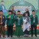Wali Kota Susanti Dewayani (sembilan kanan) pose bersama dengan PC Al Jam’iyatul Washliyah dan lainnya saat menghadiri Rakerda I periode 2021-2026 dan pelantikan PC Al Jam.iyatul Washliyah Kota Pematangsiantar di Balai Rahmat Shah, Taman Hewan, Jl. Kapten MH. Sitorus, Sabtu (29/7).(Waspada-Ist).