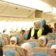 Wakil Bupati Madina Atika Azmi Utammi Nasution bersama jamaah haji di Bandara Kualanamu. Waspada/Ist