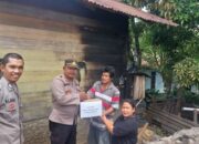 Kapolsek Pangururan Salurkan Bantuan Kepada Warga Korban Kebakaran