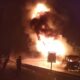 PETUGAS pemadam kebakaran sedang berusaha memadamkan api yang membakar satu unit mobil tangki pengangkut Bahan Bakar Minyak (BBM) Pertamina terbakar di jalan tol Belawan-Medan-Tanjungmorawa (Belmera), sekira pukul 19.30-20:00 WIB, Kamis (3/8/2023).