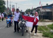 Kesbangpol Dan FKDM Batubara Bagikan Bendera Merah Putih