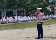 Polres P. Siantar Edukasi Dan Sosialisasikan UU LLAJ Ke Anak Sekolah 