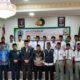 KETUA Umum MUI Sumatera Utara, Dr. H. Maratua Simanjuntak, peserta kegiatan dan pembicara foto bersama. Waspada/ist