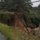 Akibat cuaca ekstrem, satu buah tiang listrik PLN mengalami tumbang dampak derasnya arus air sungai kecil di Desa Parmonangan, Tiga Balata Kabupaten Simalungun, Sumtera Utara (19/9).