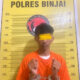 Tersangka yang diduga pengedar pil ekstasi kini diamankan di Sat Narkoba Poltrs Binjai.(Waspada/Ist)
