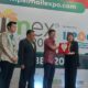 Ketua Umum Kadin Sumatera Utara, Firsal 'Dida' Mutyara menerima cinderamata berupa plakat dari Utama PT Fireworks Indonesia, Susan Tricia pada pembukaan Palmex Indonesia 2023 di Santika Premiere Dyandra Hotel & Convention, Medan, Rabu (4/10).