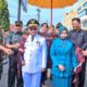 Unsur Forkopimda Padangsidimpuan 'mangulosi' Pj. Wali Kota Padangsidimpuan Letnan Dalimunthe, SKM, M.Kes bersama istri, Senin (9/10) Waspada/ist.