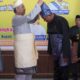 Plt Bupati Langkat H Syah Afandin Terima Anugerah Temenggong Tun Hassan