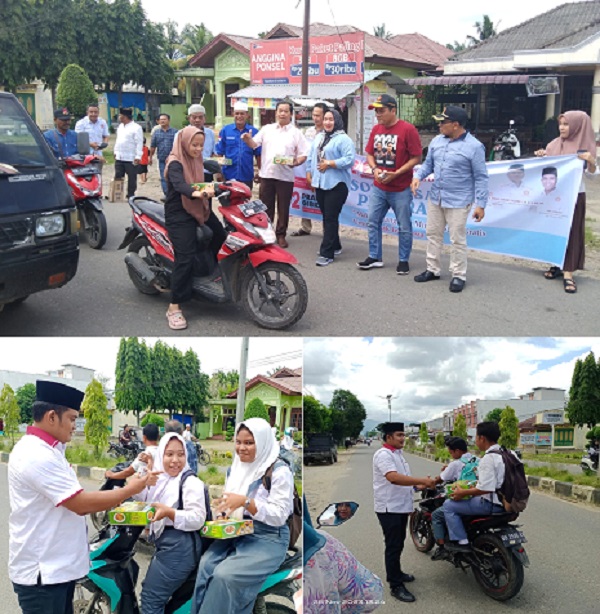 Tim Kampanye Daerah (TKD) Prabowo-Gibran membagikan makan siang dan susu gratis kepada masyarakat dan anak sekolah, Selasa (28/11). Waspada/Ist