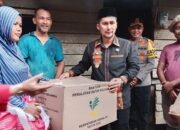 Diguyur Hujan, Pj Bupati Agara Serahkan Bantuan Korban Banjir Bandang