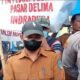 Kadisnaker Perindag Pemkab Batubara Buhari Imran dan Wakapolres Batubara Imam Alriyuddin saat berhadapan dengan kuasa hukum TPPPD di Pasar Delima Indrapura, pembacaan nama nama ini kisruh karena Kadisnaker Perindag ini dinilai langgar kesepakatan.(Waspada/Agusdiansyah Hasibuan)