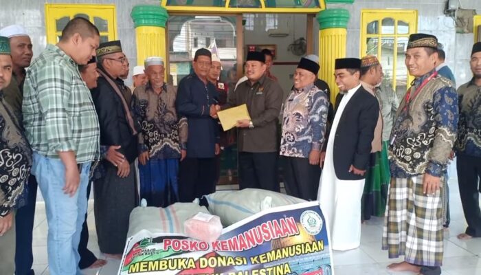PHBI-BKM Jamik Al Rasyid Bantu Palestina Rp25 Juta Dan 4 Bal Pakaian