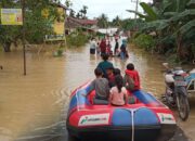 Susana banjir di Kampung Suka Jadi, Kecamatan Karang Baru, Kabupaten Aceh Tamiang, Selasa (26/12). Waspada/ Muhammad Hanafiah