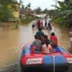 Susana banjir di Kampung Suka Jadi, Kecamatan Karang Baru, Kabupaten Aceh Tamiang, Selasa (26/12). Waspada/ Muhammad Hanafiah