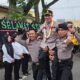 Kapolres Batubara AKBP Jose DC Fernandes dan AKBP Taufiq Hidayat Thayeb dipundak personel Polres Batubara saat lepas sambut.(Waspada/Ist)