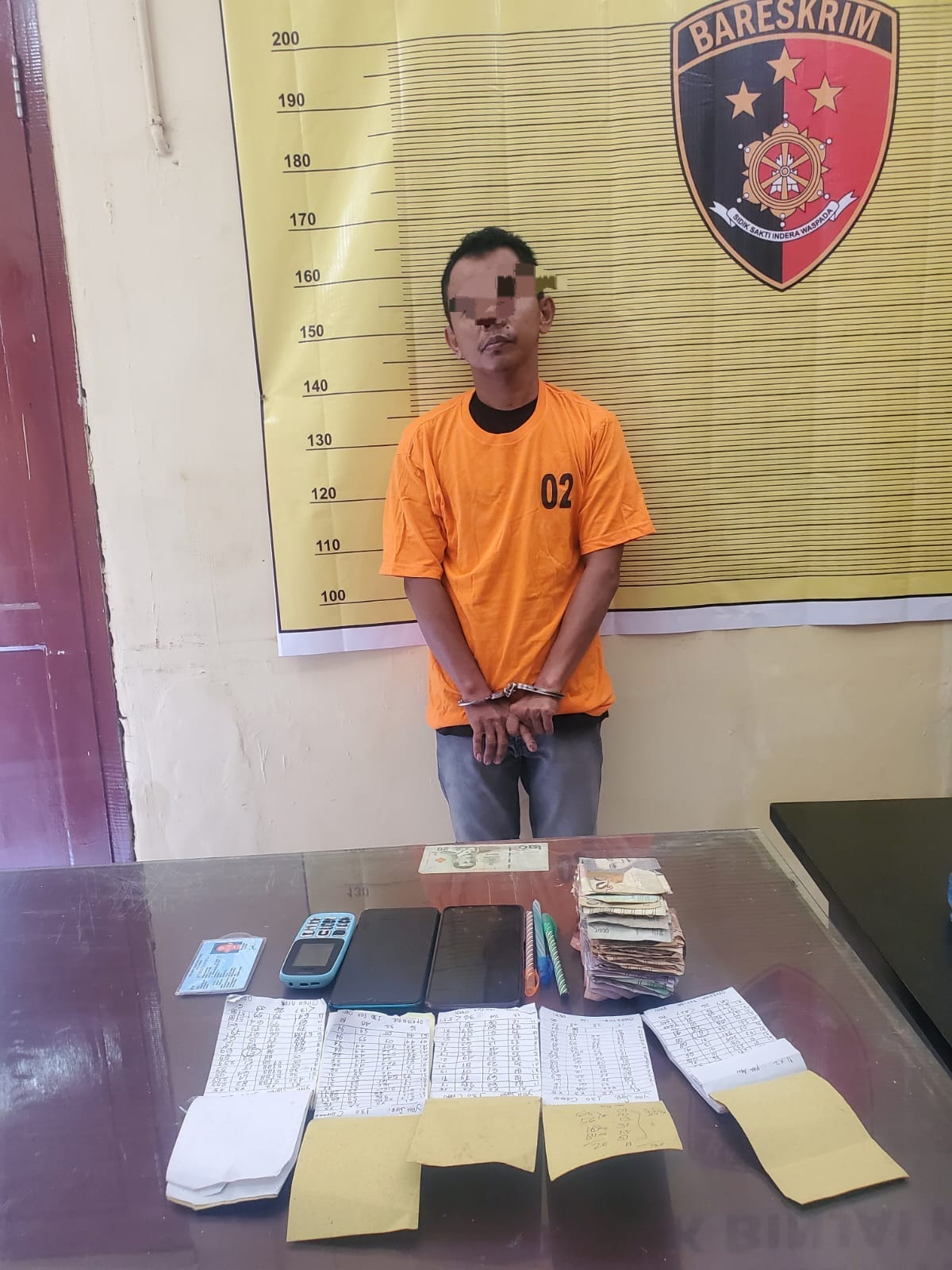 Saat Merekap, Penulis Judi Togel Ditangkap Polisi