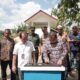 Pj Aceh Besar Muhammad Iswanto menandatangani prasasti sumur bor, menara air dan pipanisasi di Gampong Maheng, Kecamatan Kuta Cot Glie, Aceh Besar, Kamis (11/1). (Waspada/Ist)